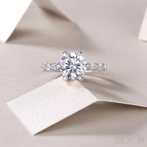 18k White Gold Brilliant Round Cut Moissanite Half Pave